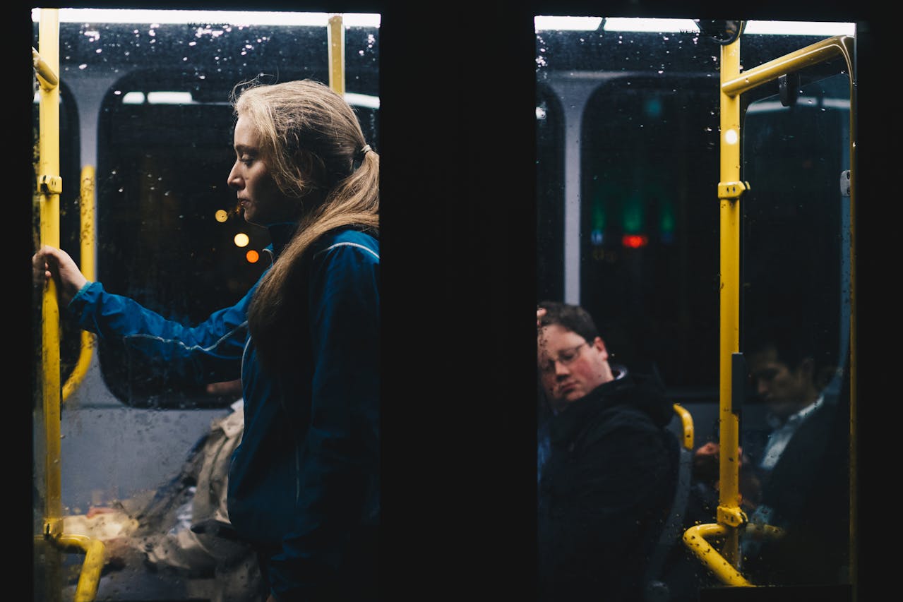 Photo by João Jesus: https://www.pexels.com/photo/photo-of-a-woman-standing-inside-bus-808700/